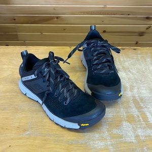 Women’s Black Danner trail shoe.